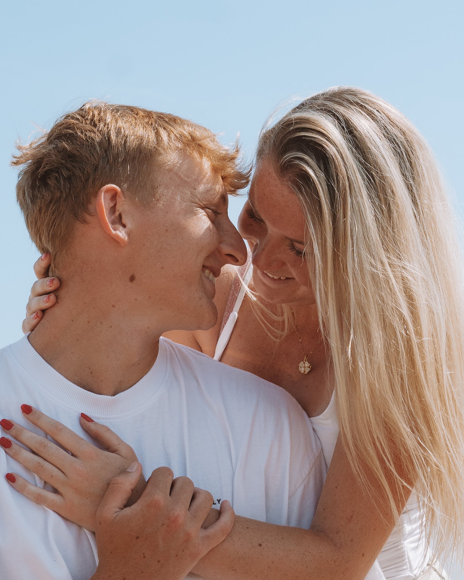 Close portrait of a couple in warm sunlight